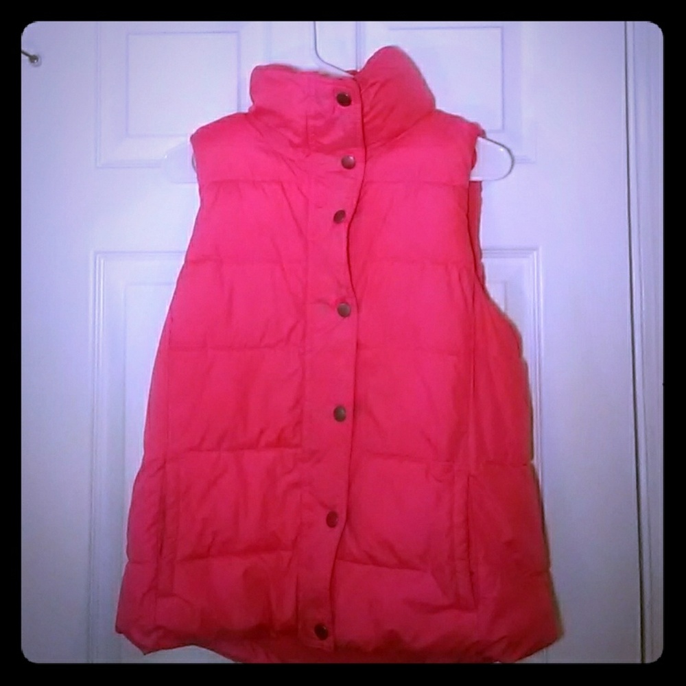 I'm selling a Pink Girls Old Naby Vest.